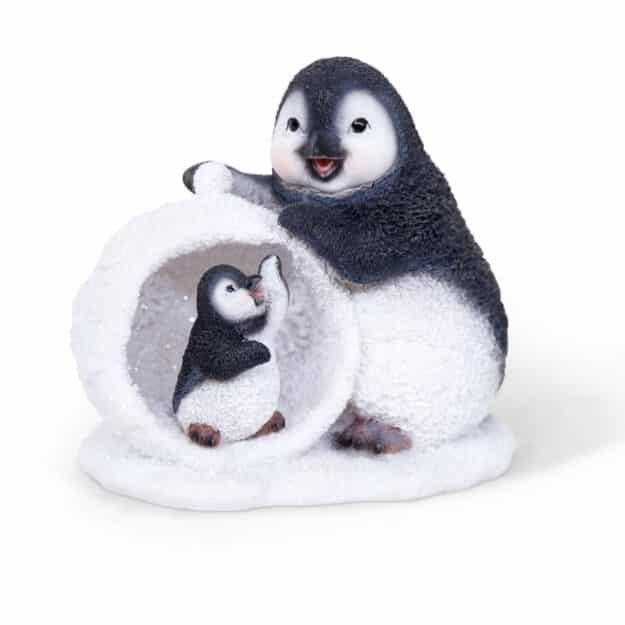 boule de neige de noël avec pingouins